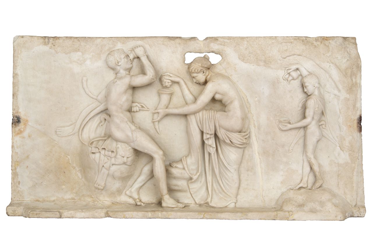 con scena dionisiaca - ninfa tra due satiri presso una fonte dalla quale zampilla vino (lastra a rilievo, bassorilievo marmoreo figurato) (secc. I a.C./ I d.C)
