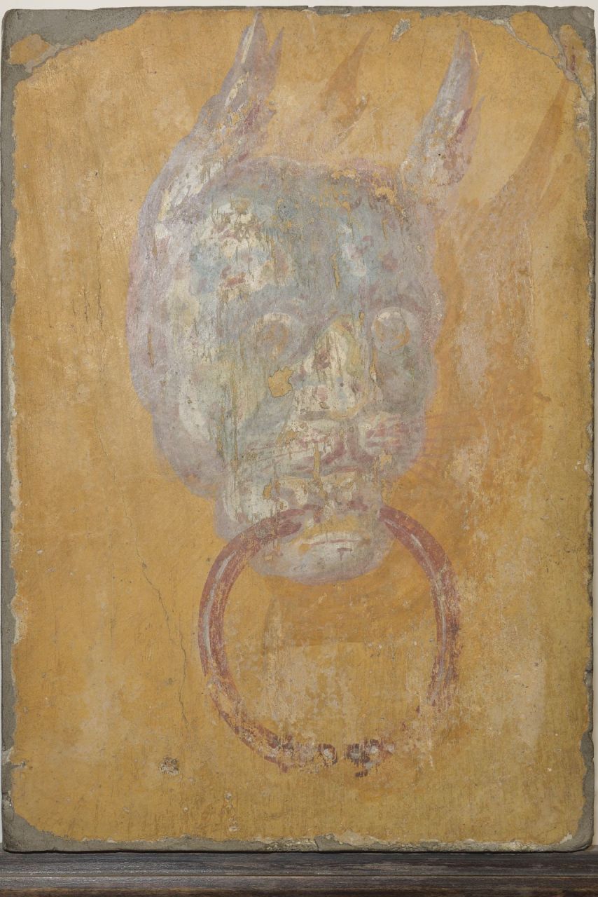 Protome di felino (opera parietale/ frammento) - produzione romana (sec. I a.C)