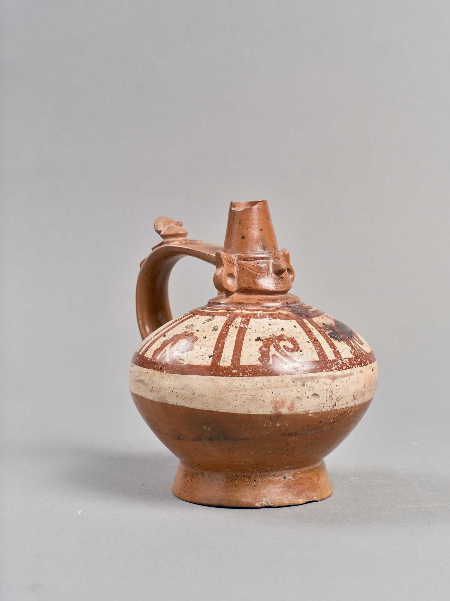 vaso- biconico, con collo cefalomorfo (VII-X)