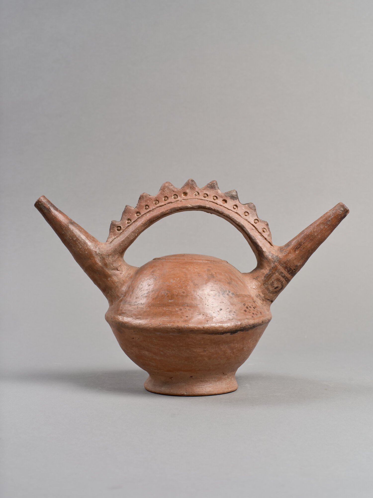 vaso/ biconico, con ansa a ponte (X-XII)