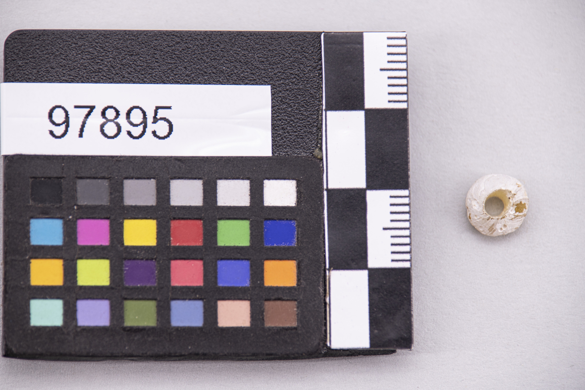 GIOIELLI E MONILI/ vago (sec. VI a.C)