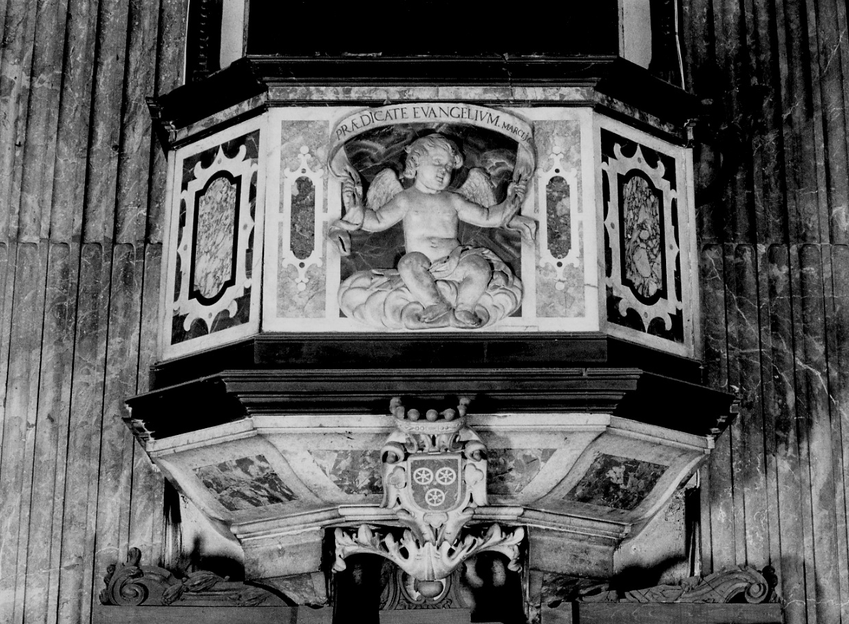 angioletto con cartiglio (decorazione plastica, elemento d'insieme) di Carlone Tommaso (terzo quarto sec. XVII)