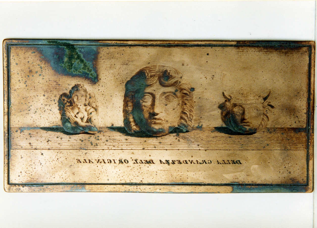 tre appliques di bronzo: erote con uccello, mascheretta dionisiaca,mascheretta di Io (matrice) di Alloja Giuseppe, Campana Vincenzo (sec. XVIII)